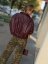 Burgundy kožená bomber bunda s golierom a zipsom, elegantný jesenný kúsok v univerzálnej veľkosti.